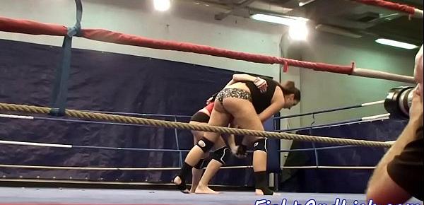  Lesbian babes wrestle in a boxing ring